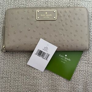 KATE SPADE ♠️  KAY STREET NEDA CONTINENTAL WALLET IN LEATHER AND COMOR SIDEWALK